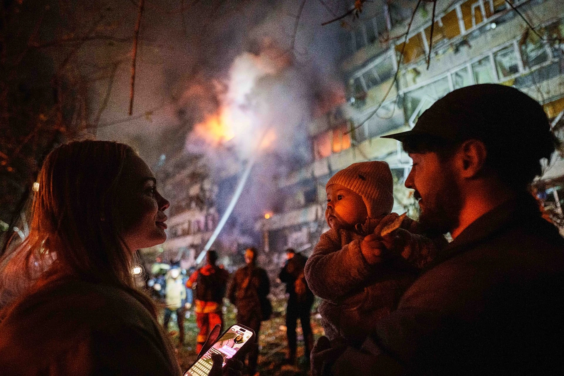 A damaged multi-storey residential building is seen on fire after a Russian missile strike on Kyiv, 13 October, 2026